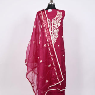 Rani color Party Wear Suit with embroidery and organic organza dupatta