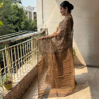 Vanaspati Ajrakh Hand Block Print Kota Doria Cotton Saree with zari border and unstitched Blouse Piece