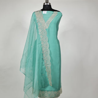 Sea Green Party Wear Designer Suit fabric with lace work on bottom