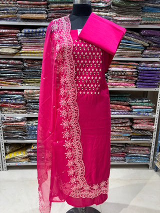 Rani Color Party Wear Suit with Neck embroidery and organic organza dupatta with lace work
