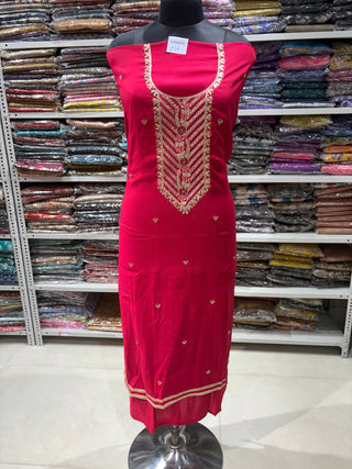 Rani color Party Wear Suit with Neck embroidery and silk dupatta