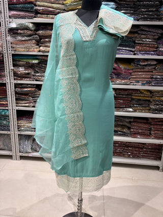 Sea Green Party Wear Designer Suit fabric with lace work on bottom