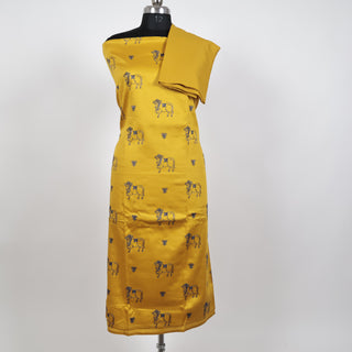 Yellow Party Wear Suit fabric with embroidered cow motifs and silk dupatta