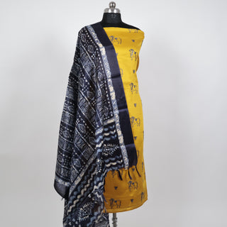 Yellow Party Wear Suit fabric with embroidered cow motifs and silk dupatta