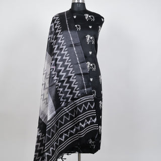 Black Party Wear Suit fabric with embroidered cow motifs and ikkat print silk dupatta