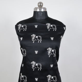 Black Party Wear Suit fabric with embroidered cow motifs and ikkat print silk dupatta