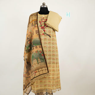 beige color dress material with printed musling dupatta and shantoon bottom